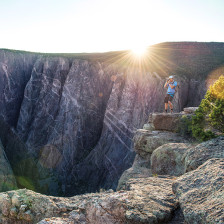 Hiker snapping a photo at Black Canyon of the Gunnison National Park in Colorado